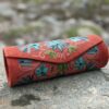 Red Cylindrical Shaped Clutch with Crewel Embroidery