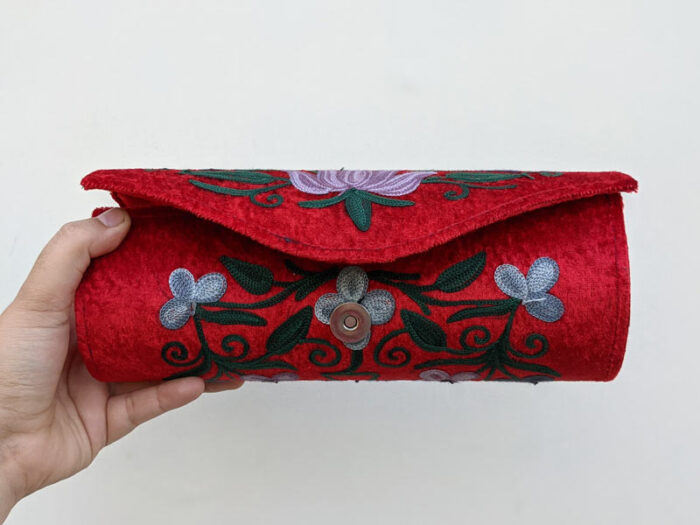 Red Cylindrical Shaped Clutch with Aari Embroidery