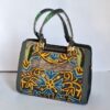 Lavish Hand Crewel Work Handheld Bag
