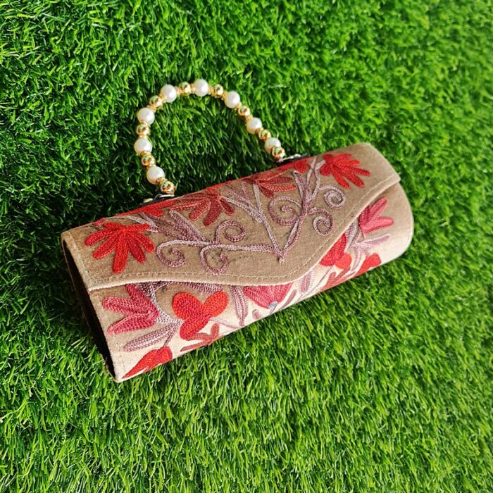 Light Color Velvet Clutch With Pearls and Aari Work