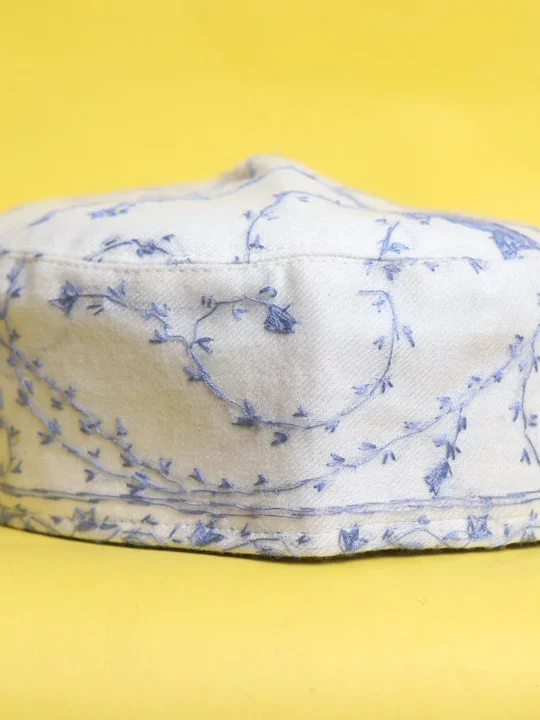 Yousufi Toosha White and Blue Cap Adorned with Hand Sozni Work | Akh Border
