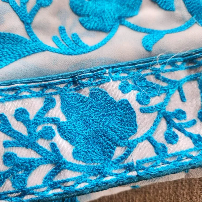 Chinari White Akh Rang Georgette Saree with Blue Fine Aari Embroidery - Roshe Collection - Image 2