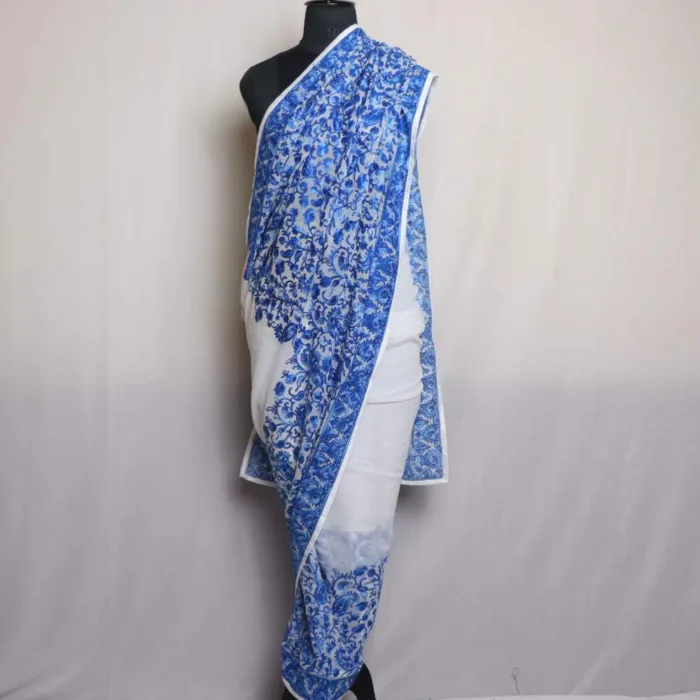 Badami Jama Akh Rang Blue Georgette Saree with Elegent Aari Detailing - Roshe Collection