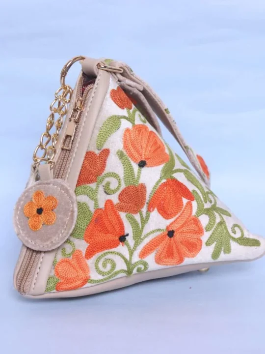 Cream Velvet Triangle Potli Bag with Elegent Aari Embroidery