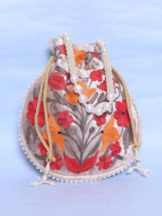 Stylish Cream Velvet Potli Bag with Detailed Aari Work
