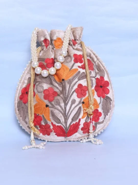 Cream Velvet Aari Embroidered Potli Bag for Festive Occasions