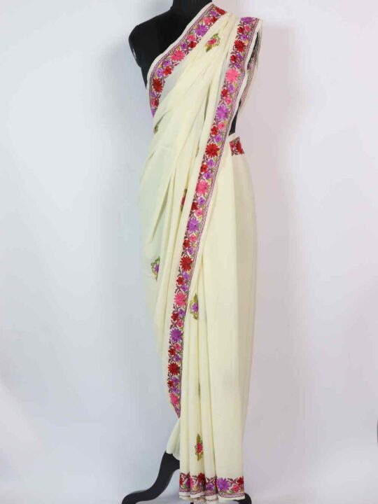 White Crepe Munira Pallu Saree adorned with Aari Work